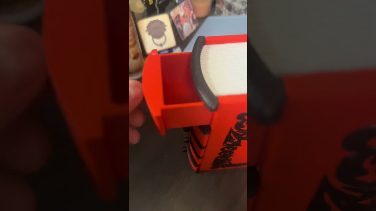 Recovered image of a red 3D-printed faux book jewelry box with a concealed drawer